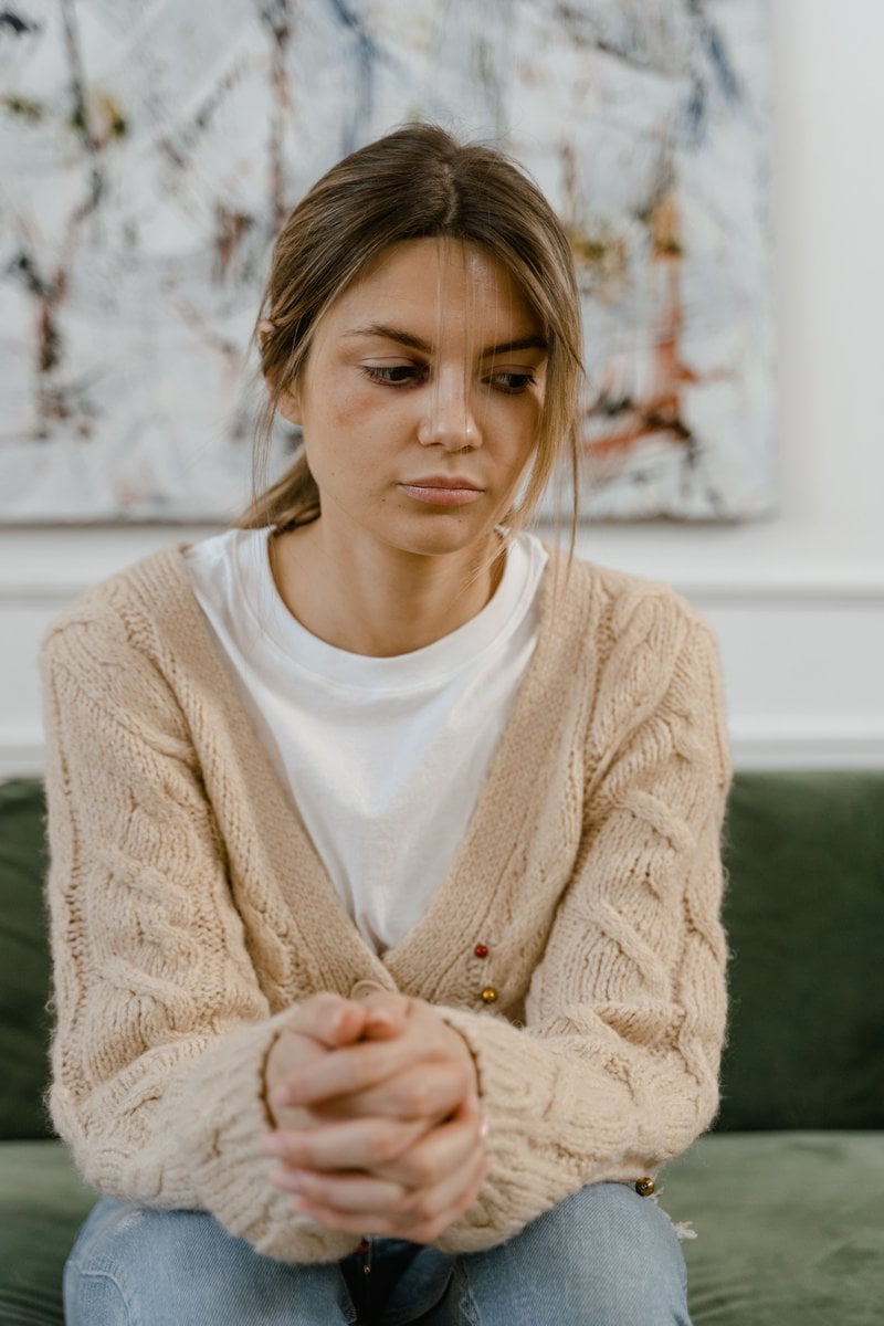 A Sad Woman Sitting on a Chair &middot; Free Stock Photo