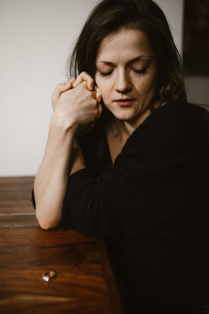 Crying Woman Leaning on Brown Wooden Table &middot; Free Stock Photo