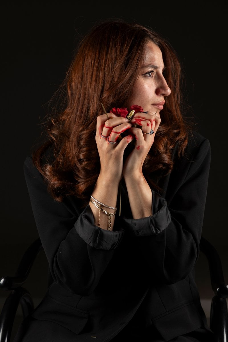Emotional Portrait of Woman Holding Rose &middot; Free Stock Photo