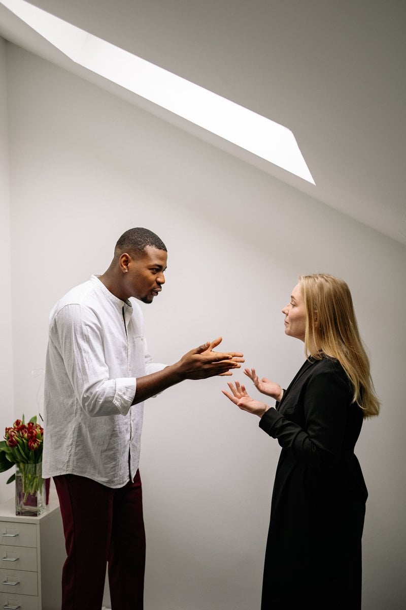 Man Having an Argument with a Woman &middot; Free Stock Photo