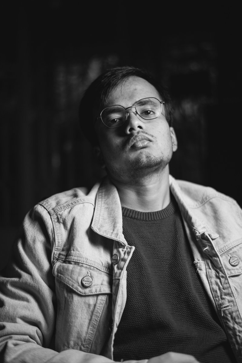 Portrait of a Serious Man Wearing Eyeglasses in Black and ...