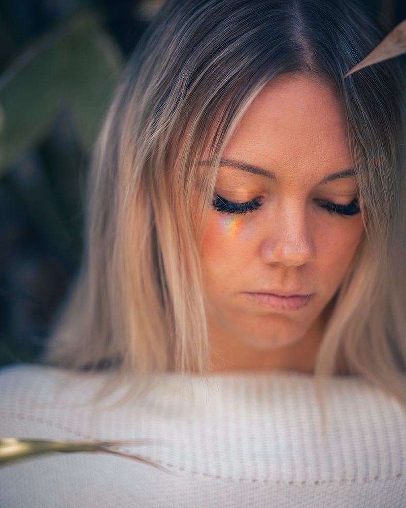 Sad woman with blond hair looking down &middot; Free Stock Photo