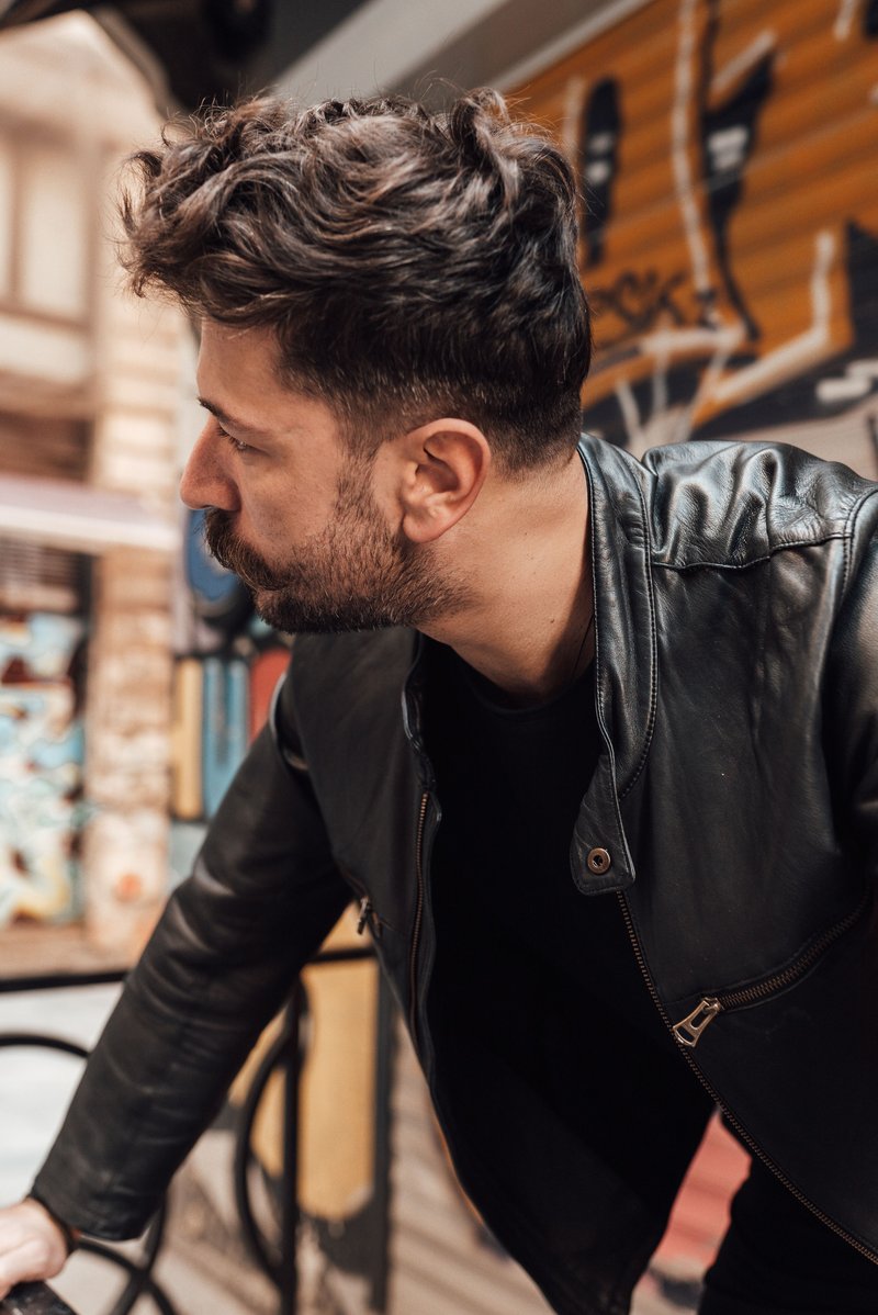 Serious man standing on city street &middot; Free Stock Photo