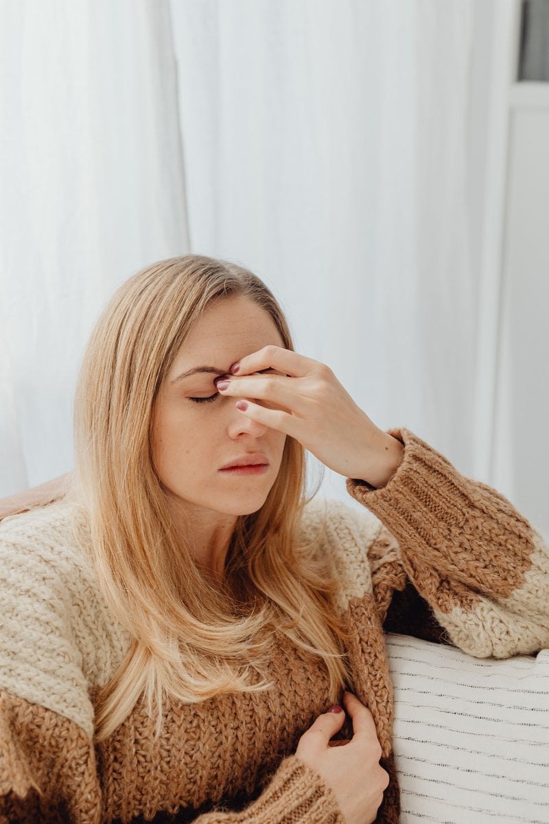 Woman Holding Her Nose Because of Sinus Pain &middot; Free Stock Photo