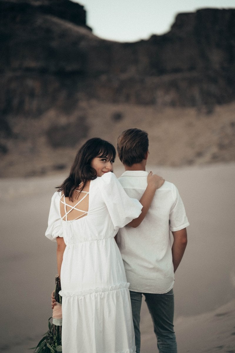 Loving newlyweds standing on sandy ground in nature &middot; Free ...