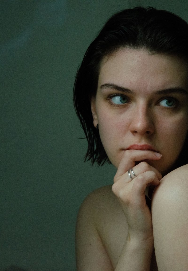 Thinking Woman with Hand on Chin &middot; Free Stock Photo