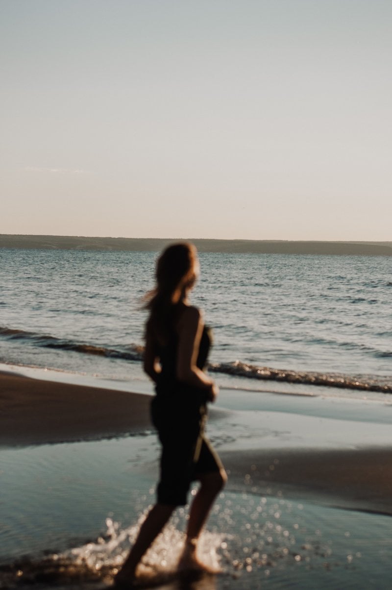 Woman running on beach &middot; Free Stock Photo