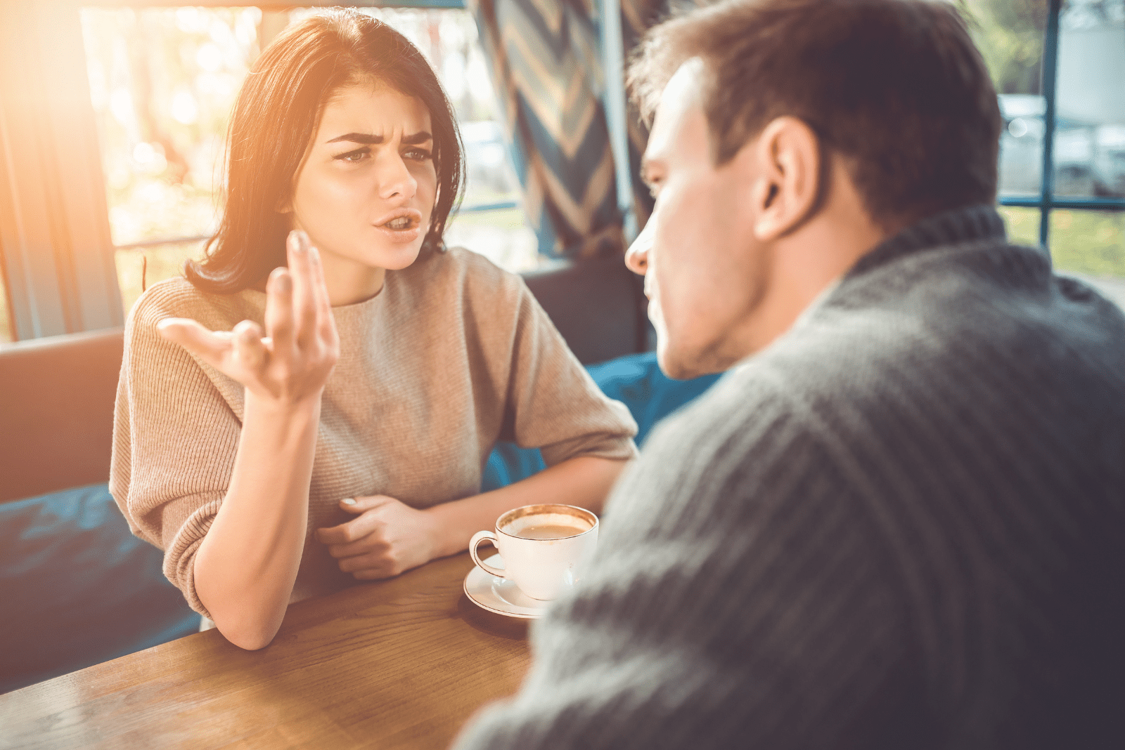 a woman argues with a man